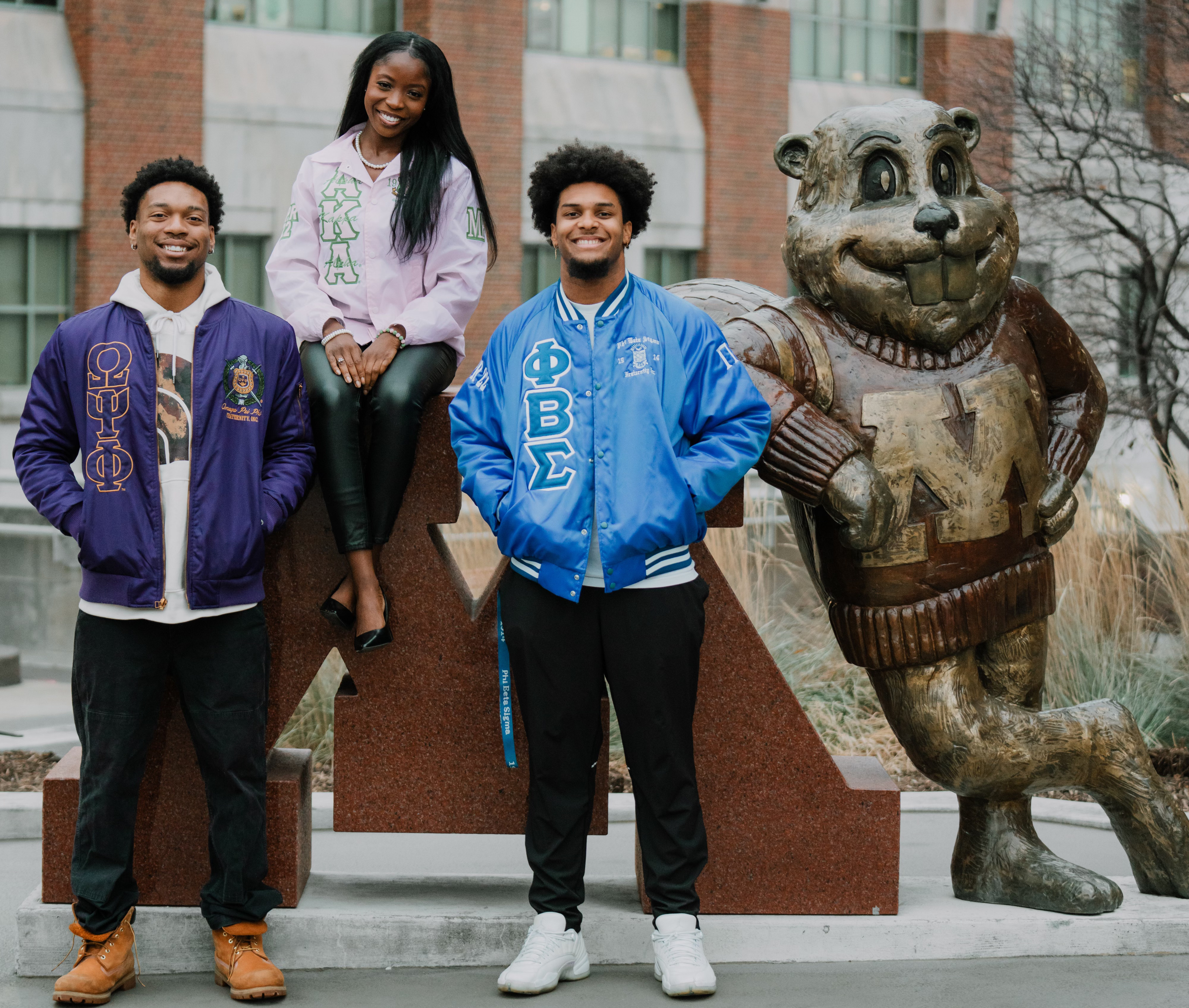 NPHC group photo at the Goldy Gopher statue in front of CMU