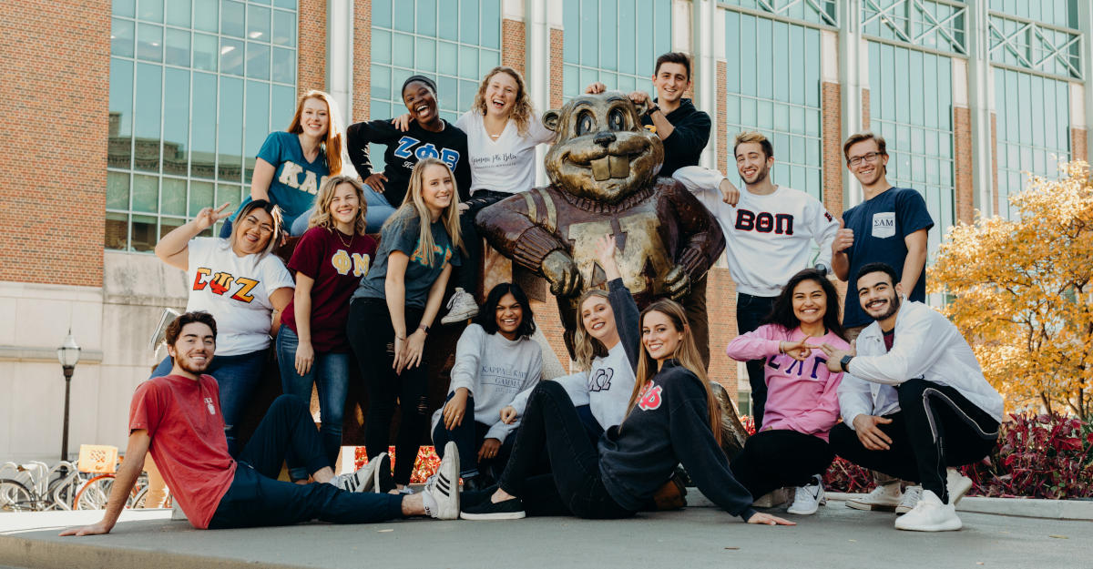group image of students wearing shirts from various UMN fraternities and sororities.